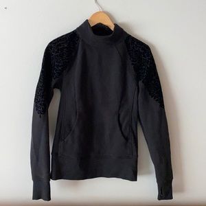 Lululemon size 4 black floral flock pullover.